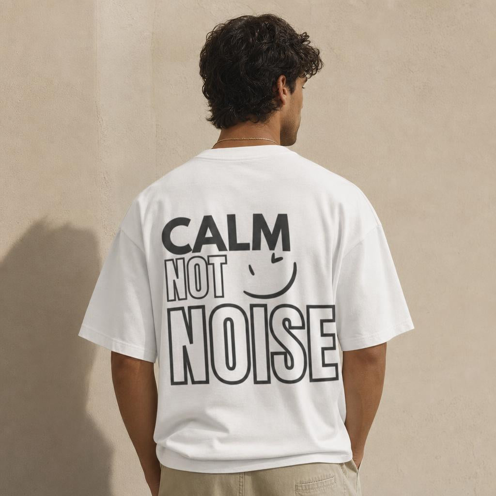 Calm Not Noise print on the back of the boxy tee